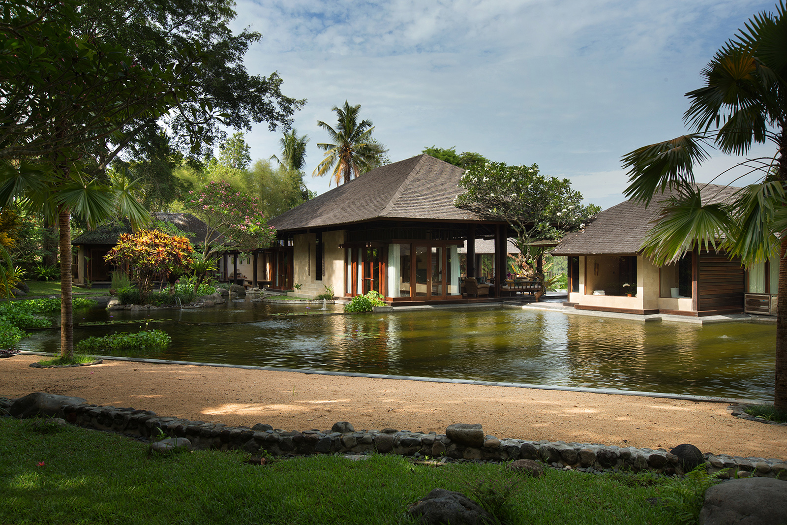 Villa Kamaniiya - ubud holiday entrance beside pond