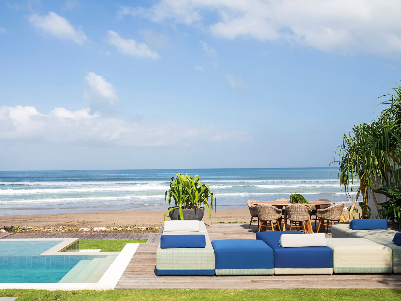 Noku Beach House - Pool and open air seating area